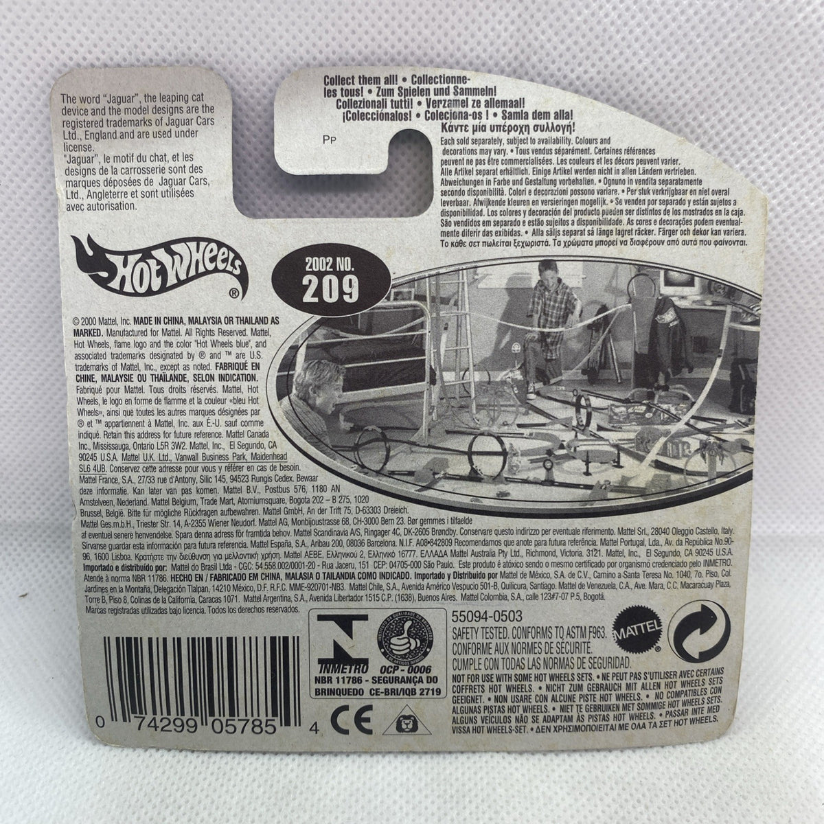 Back of Hot Wheels blister packaging with #209 Jaguar D-Type details and barcode