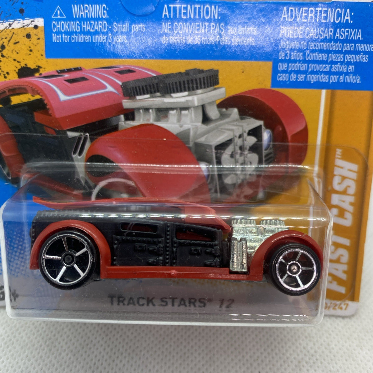 Hot Wheels diecast car, red body with black grille and silver engine, sealed blister