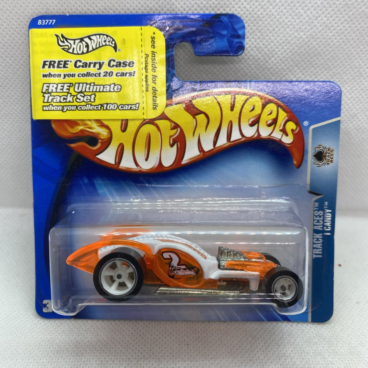 Hot Wheels orange and white race car toy on blue blister card packaging
