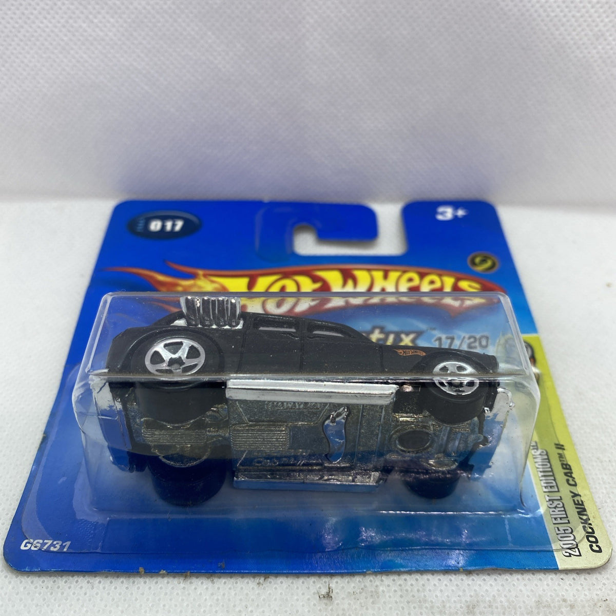 Hot Wheels die-cast car front view in clear blister on blue card
