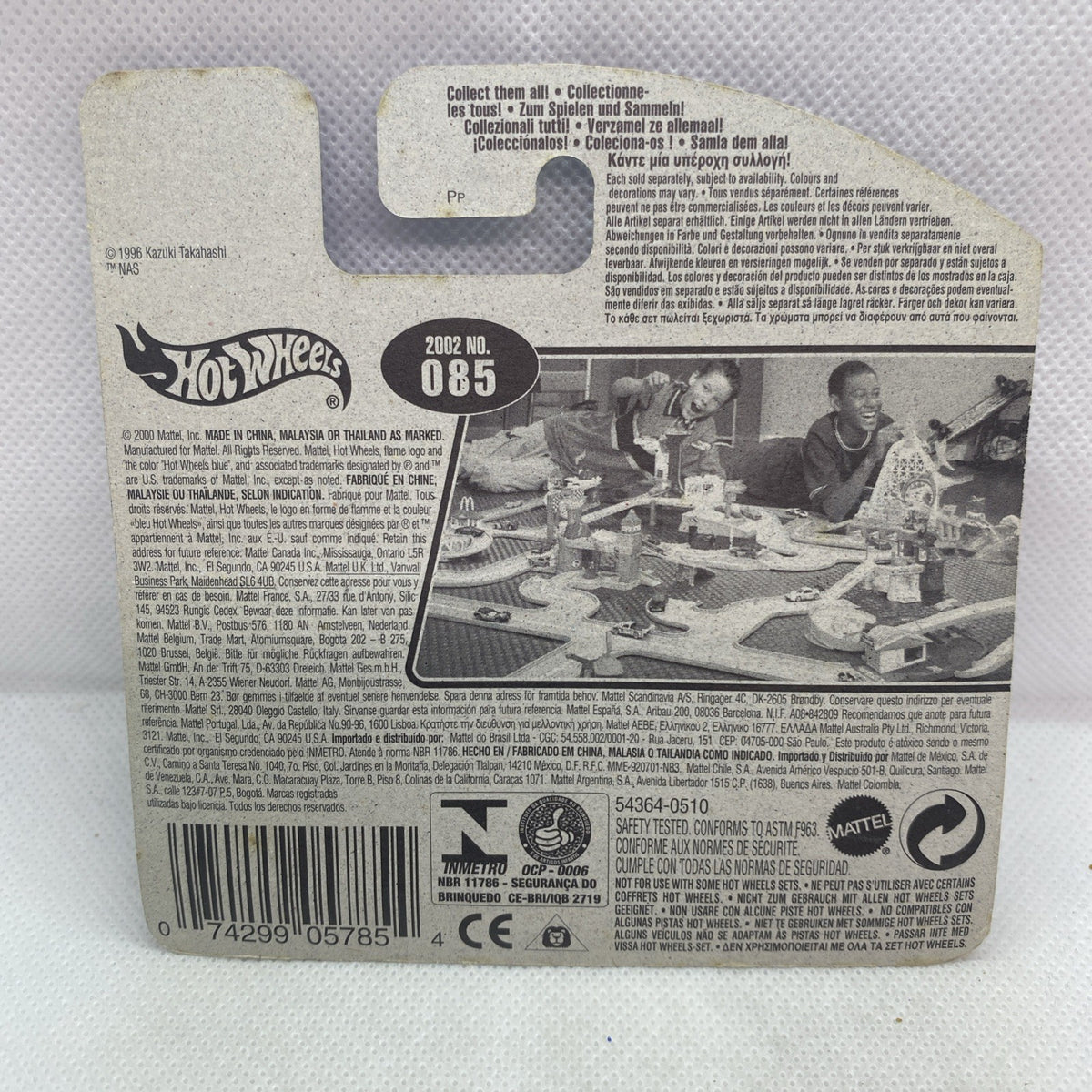 Hot Wheels cardback for sealed blue car, 2002 No. 085 info and barcode.