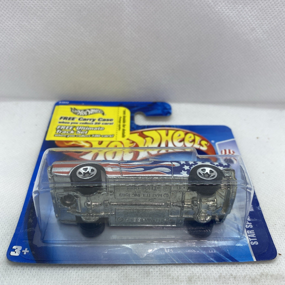 Hot Wheels die-cast Mustang toy car rear view in clear blister package