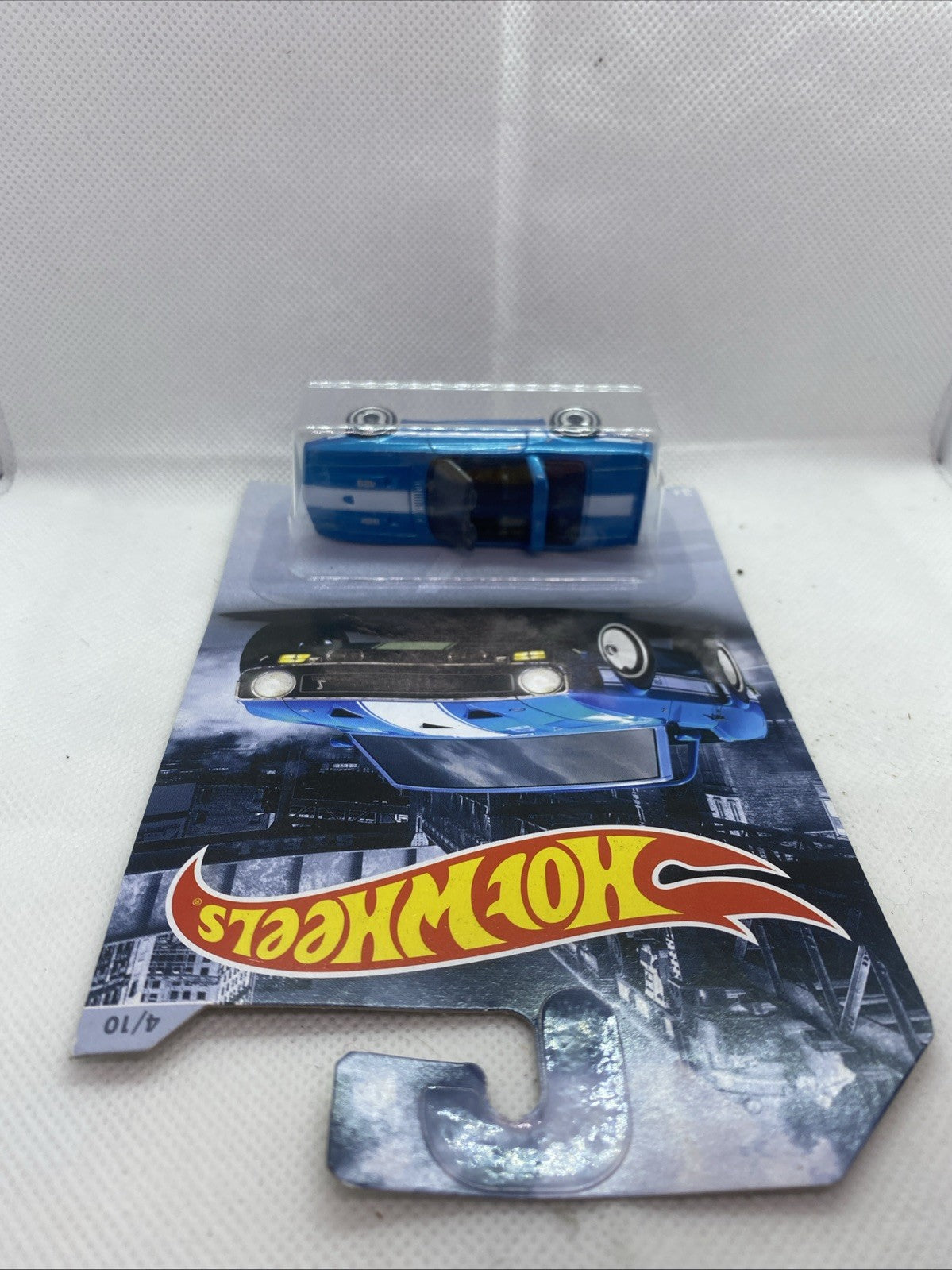 Hot Wheels blister pack with blue '69 Shelby GT500 die-cast car and hang tab