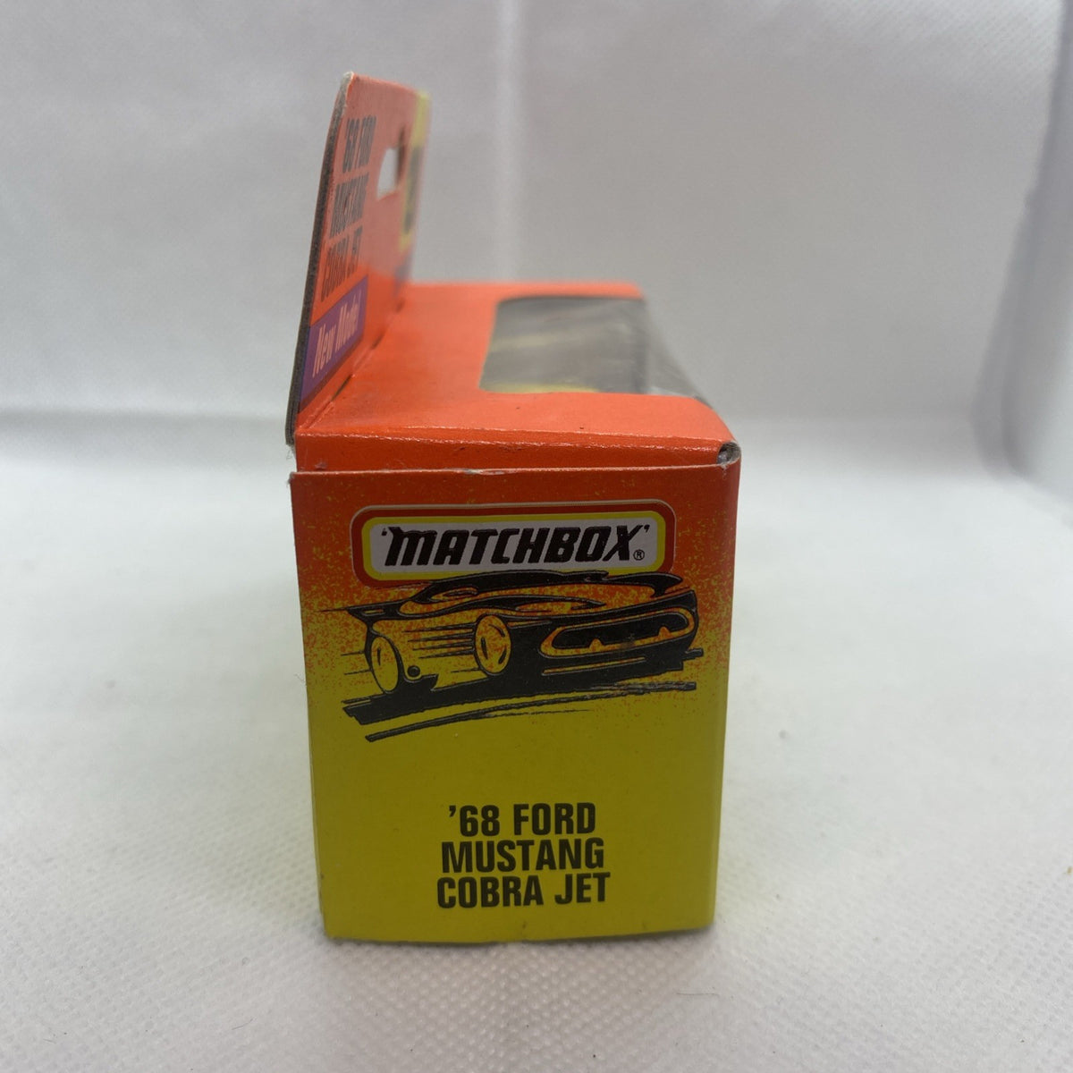 Matchbox die-cast '68 Ford Mustang Cobra Jet toy car box, front-left angle