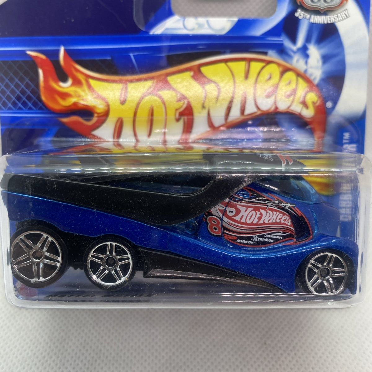 Blue Hot Wheels die-cast car in blister pack, flame logo on door and black top