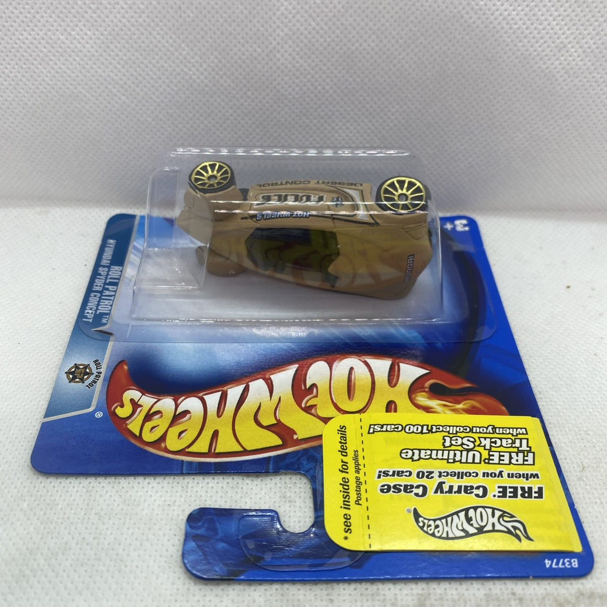 Hot Wheels Hyundai Spyder concept police die-cast in beige with black roof and gold wheels
