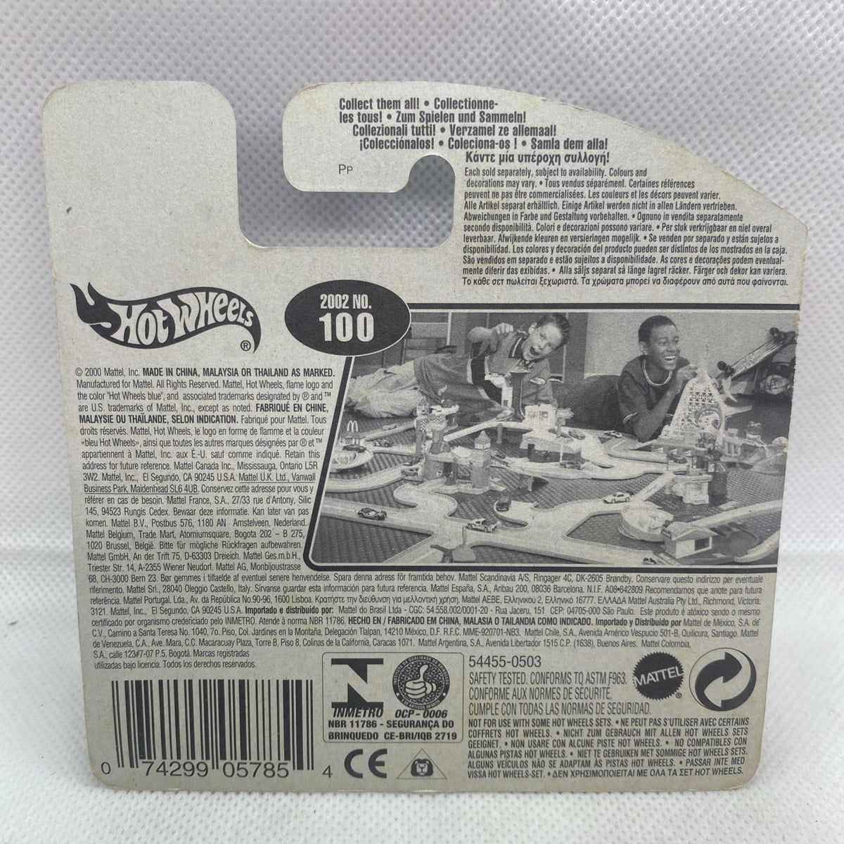 Hot Wheels collectible card back with printed info and grille vehicle photo