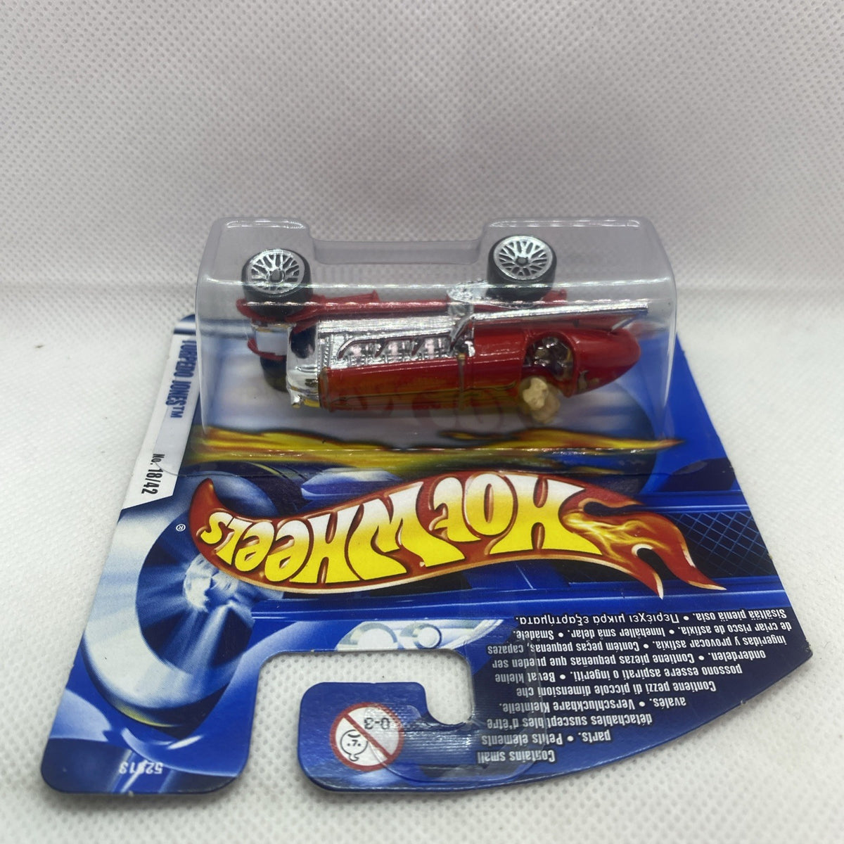 Hot Wheels red and silver torpedo car in clear blister on blue backing card
