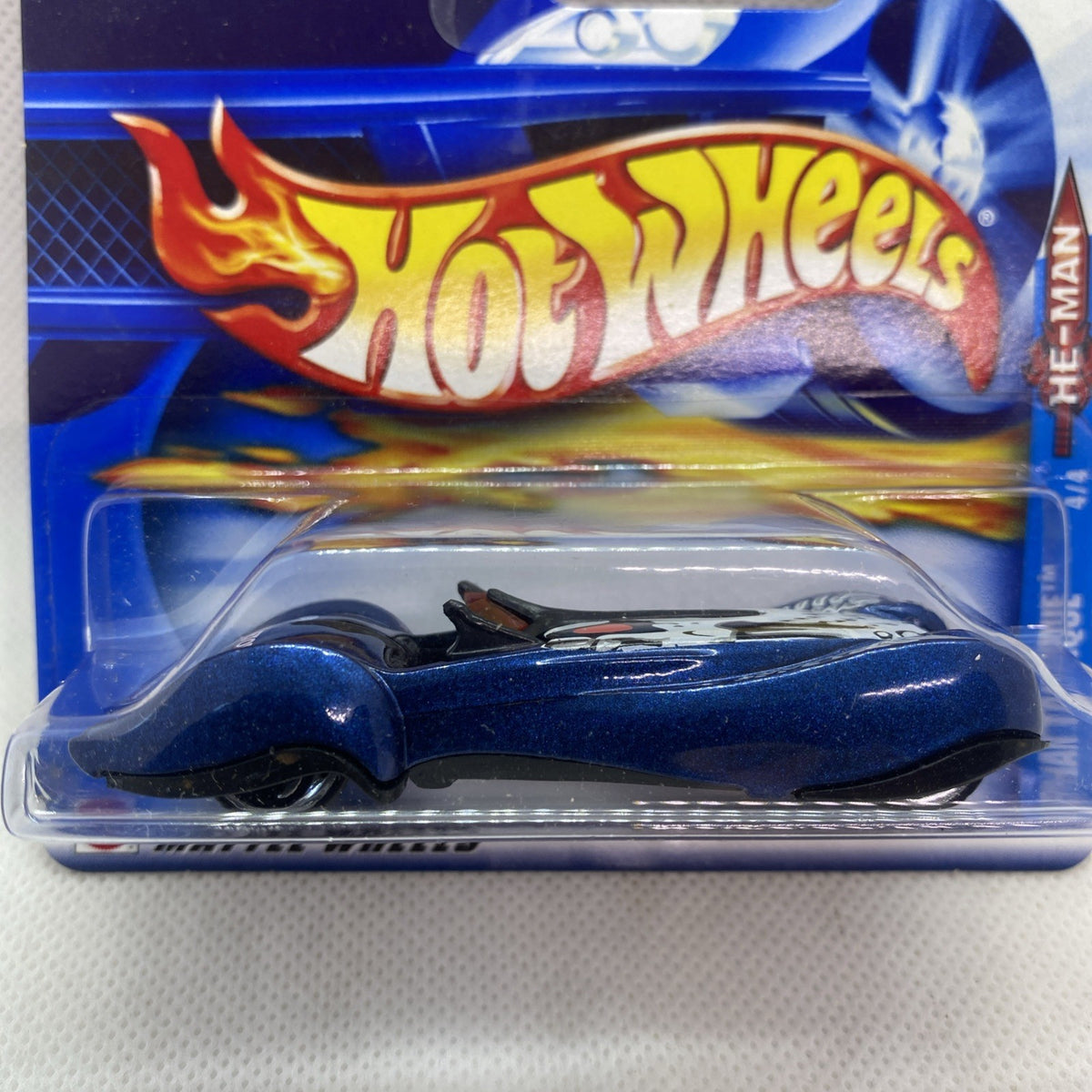 Hot Wheels die-cast car on card, blue body with flame decals and silver stripe
