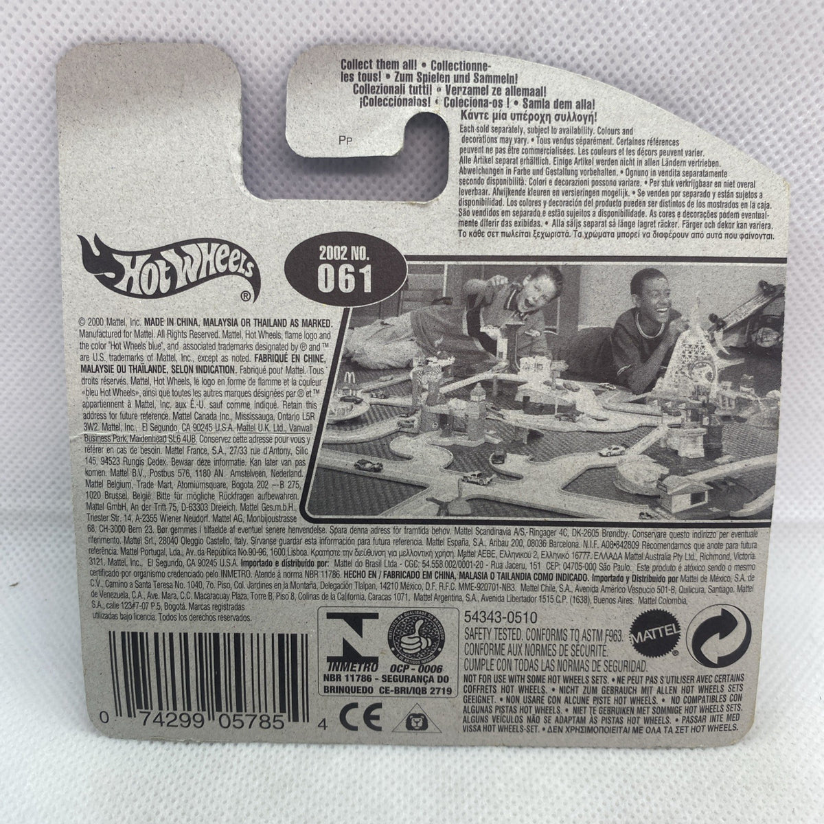Hot Wheels car blister back card with barcode and product info text