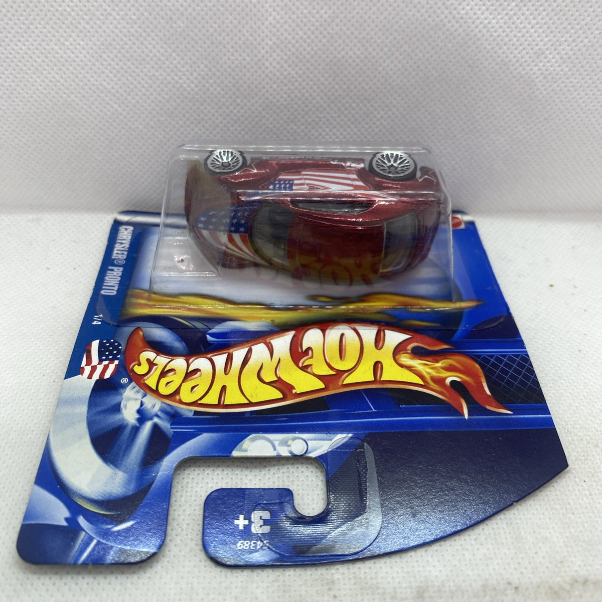 Hot Wheels Chrysler Pronto die-cast in blister, maroon car on blue card