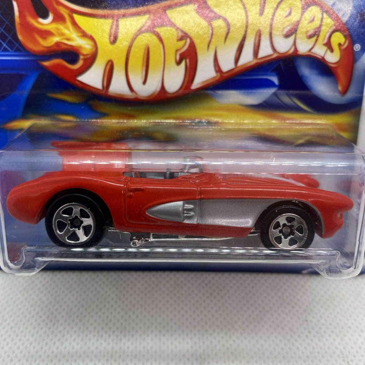Hot Wheels red Corvette SR-2 die-cast in blister, side view with chrome wheels