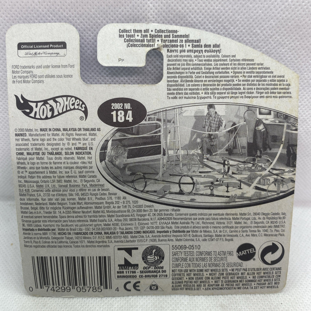Hot Wheels blister card back with 2002 No.184 Ford Focus artwork and vehicle specs.