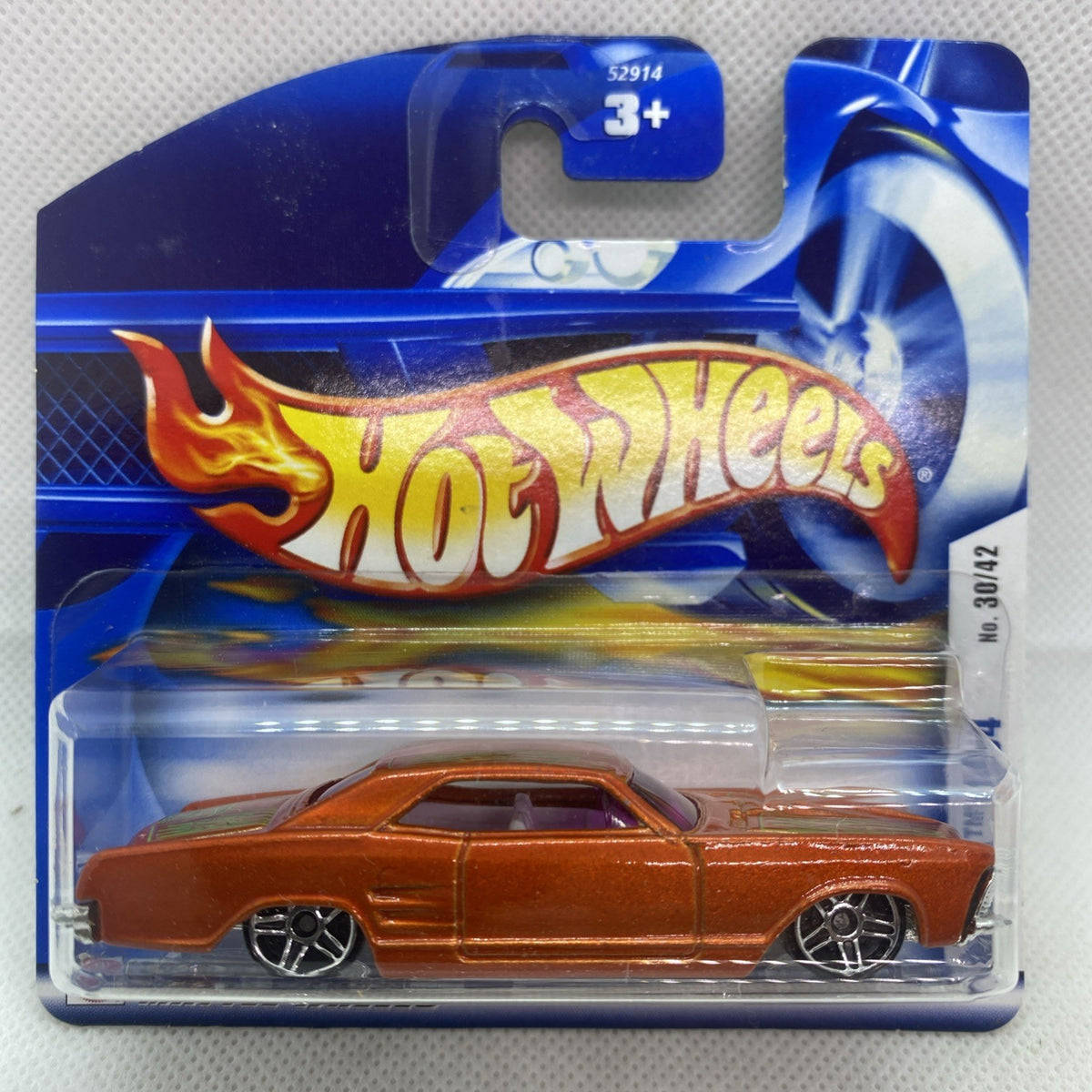 Orange classic die-cast car in clear Hot Wheels blister pack, front view