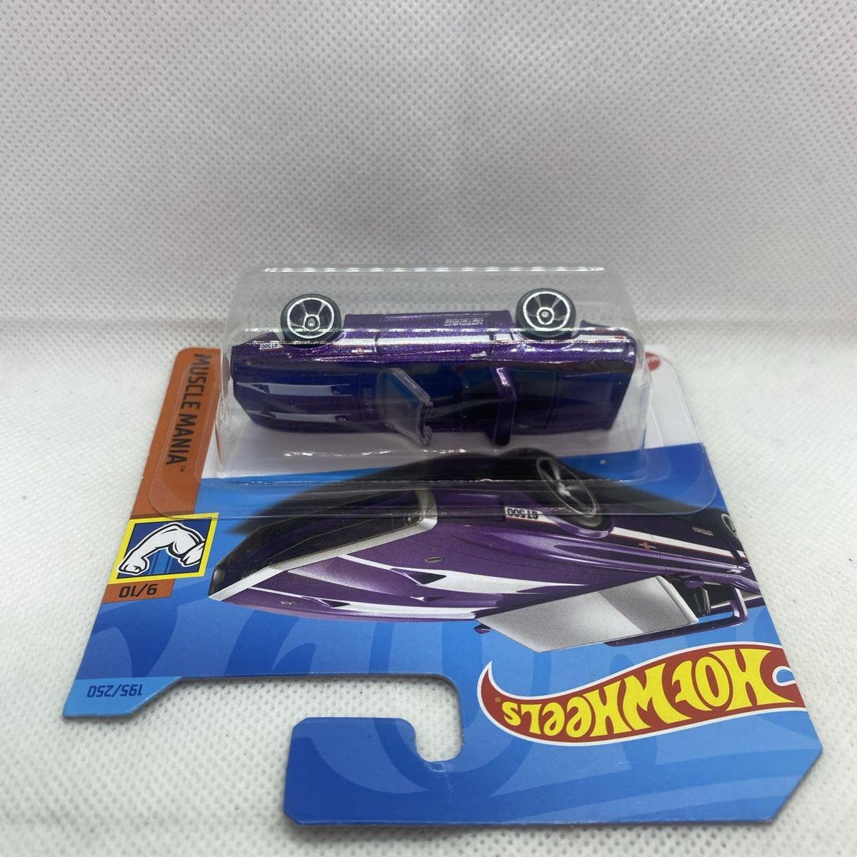 Hot Wheels purple muscle car die-cast in blister card, top and side view