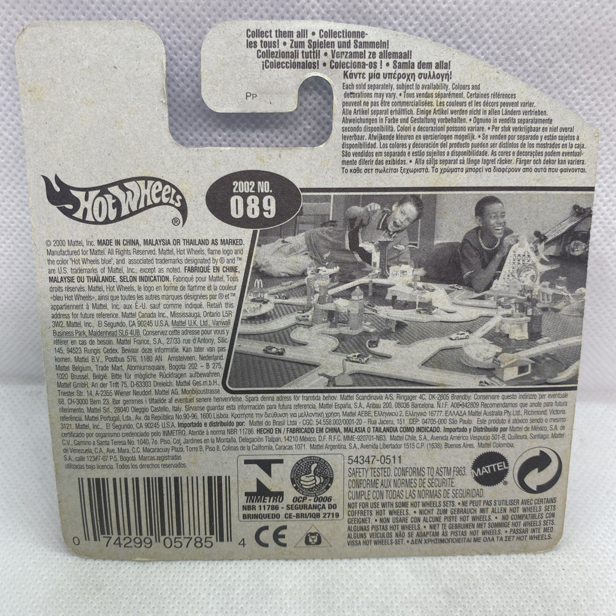 Back of die-cast car blister card with 2002 No. 089 and safety info