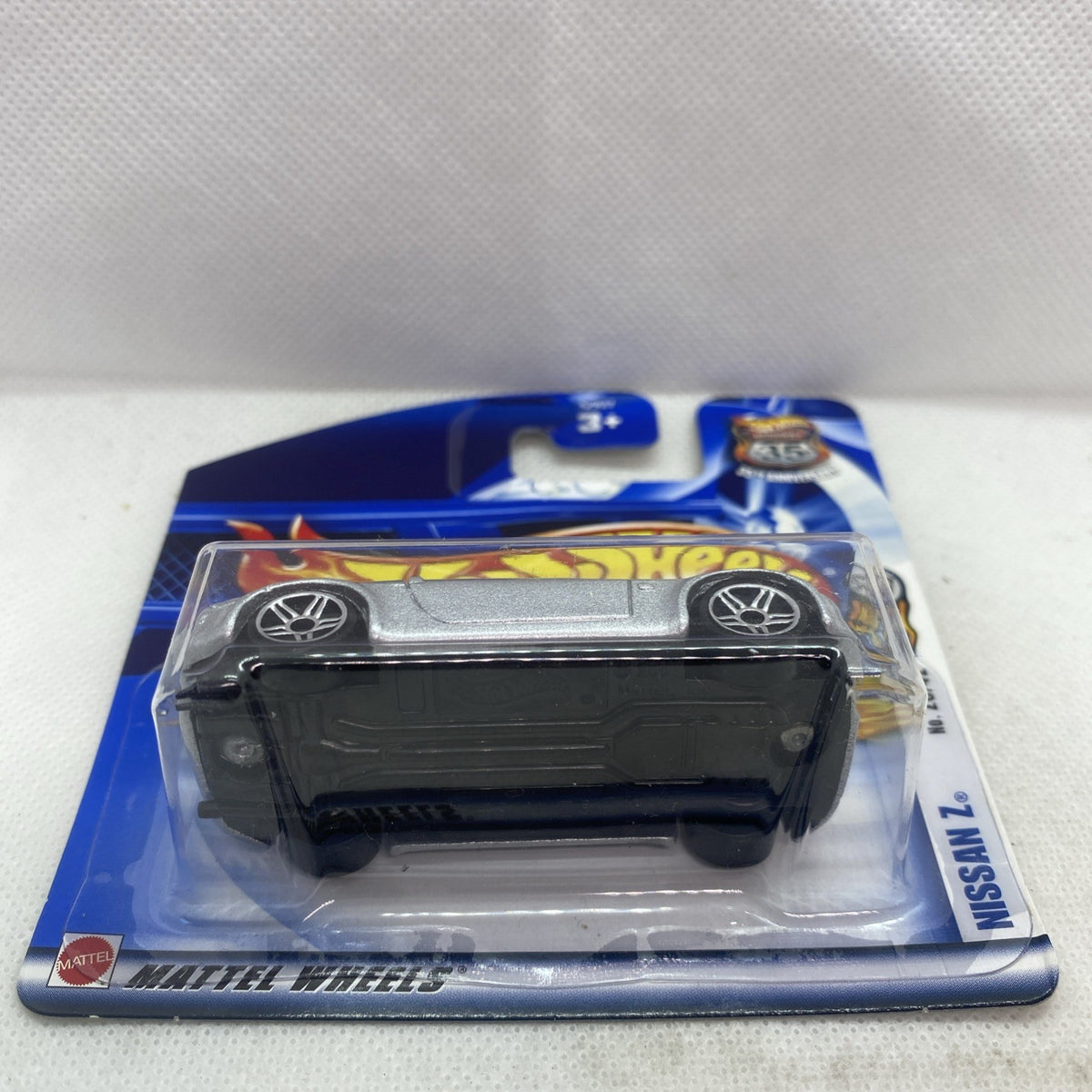 Hot Wheels die-cast Nissan Z 2002 in clear blister with dark base tray