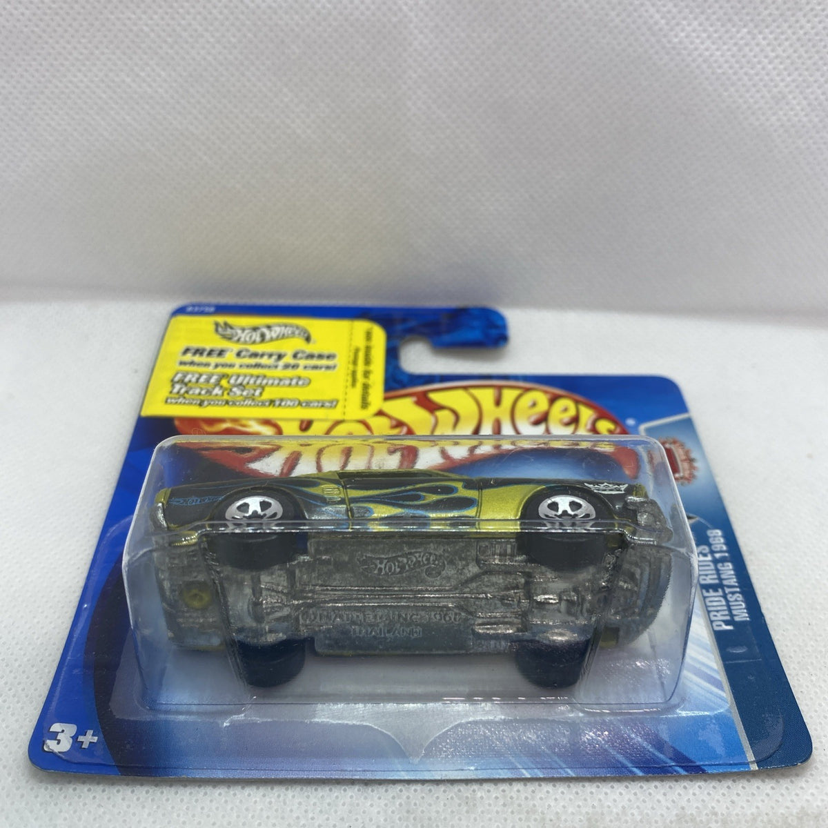 Hot Wheels Mustang 1968 Pride Rides green die-cast car, side view in sealed blister