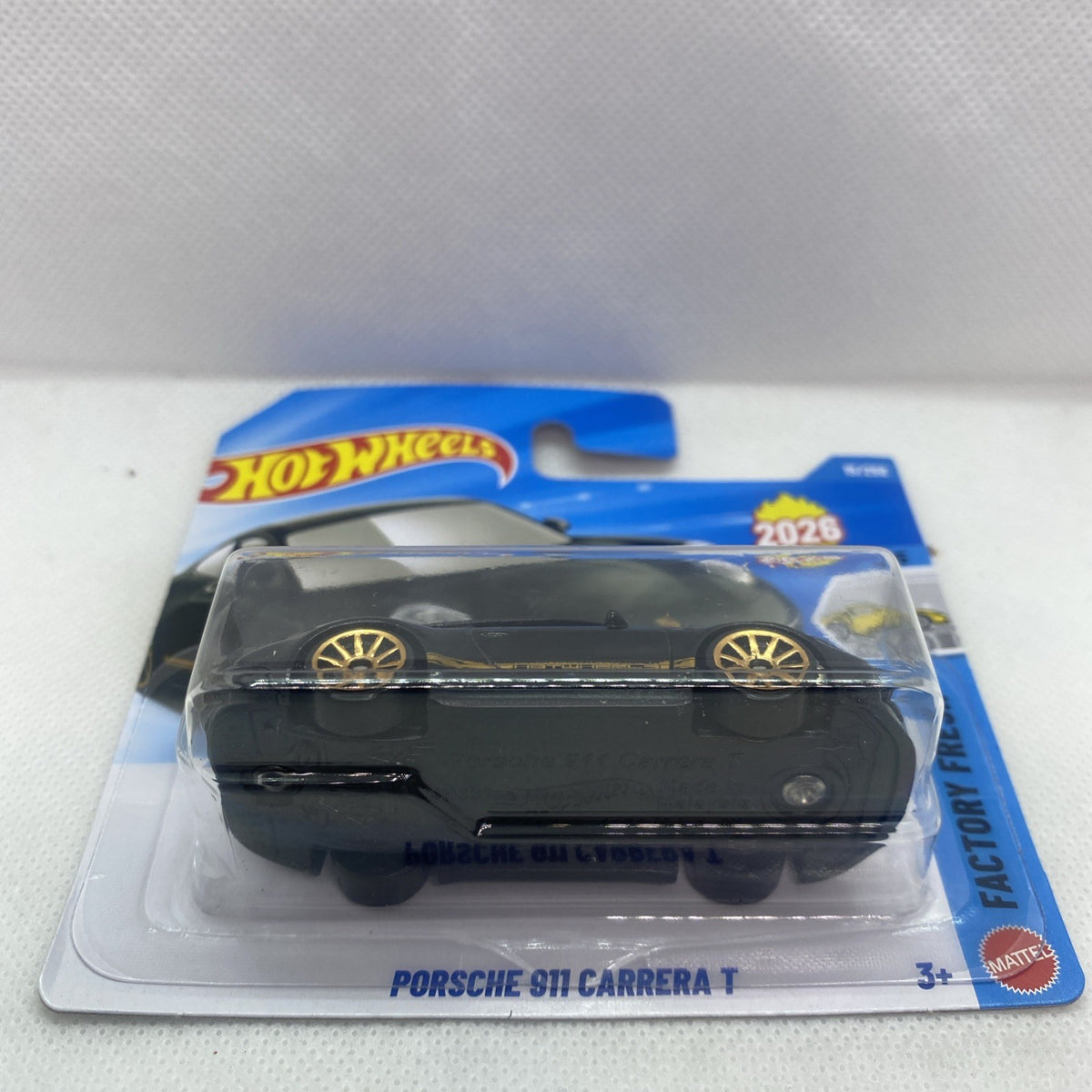 Hot Wheels black Porsche 911 Carrera T die-cast toy car in sealed blister