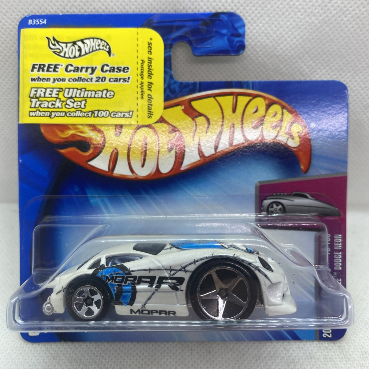 Hot Wheels die-cast car in blister pack, white race car with black wheels