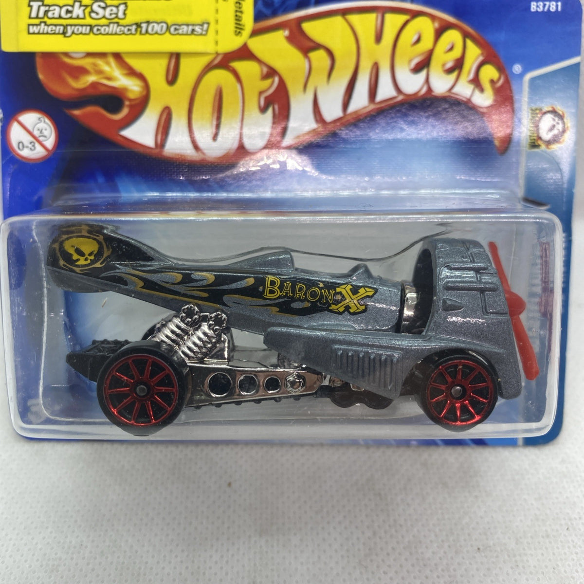Hot Wheels die-cast truck in clear blister, Brodax graphics and red wheel accents