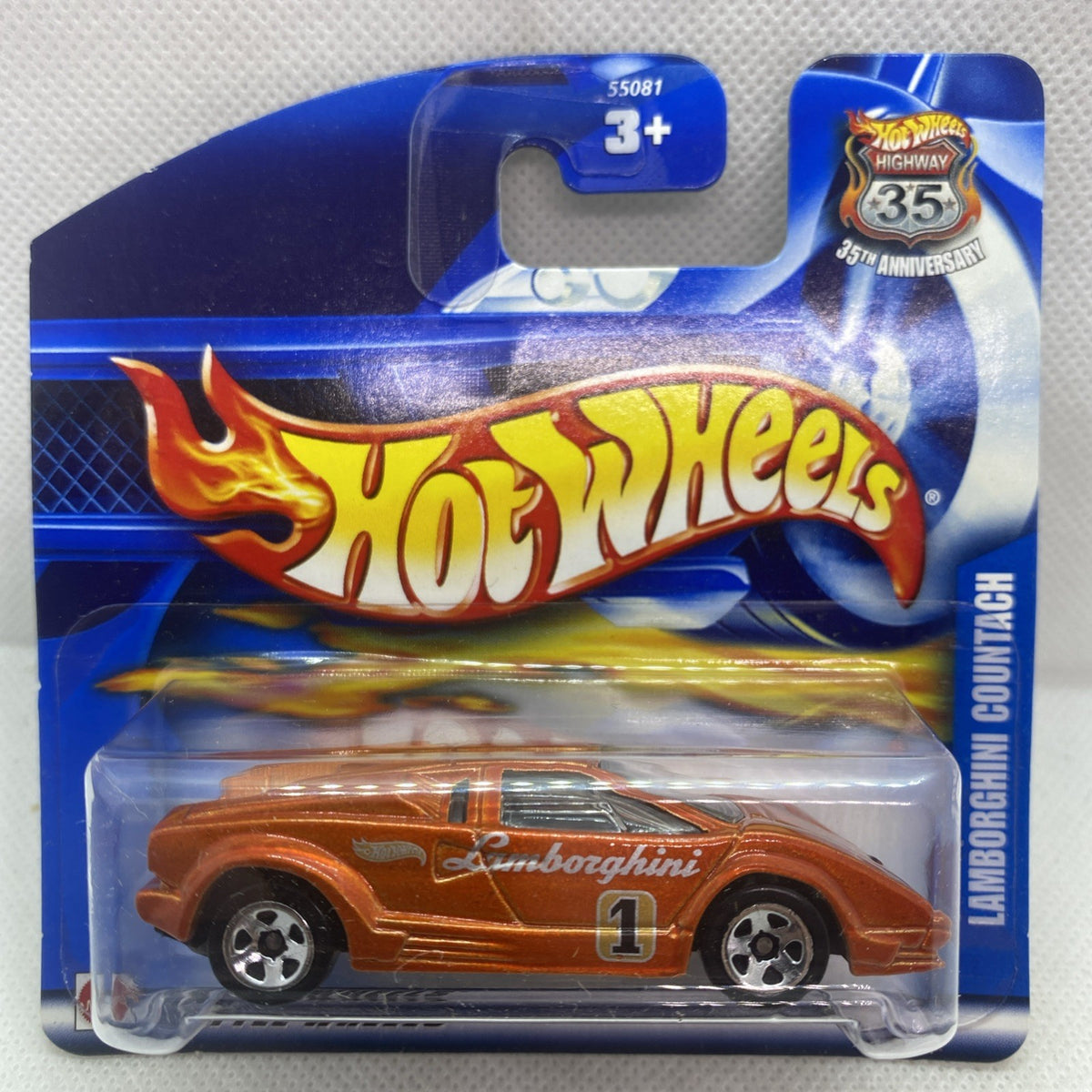 Hot Wheels Lamborghini Countach die-cast car in blue blister card, orange finish