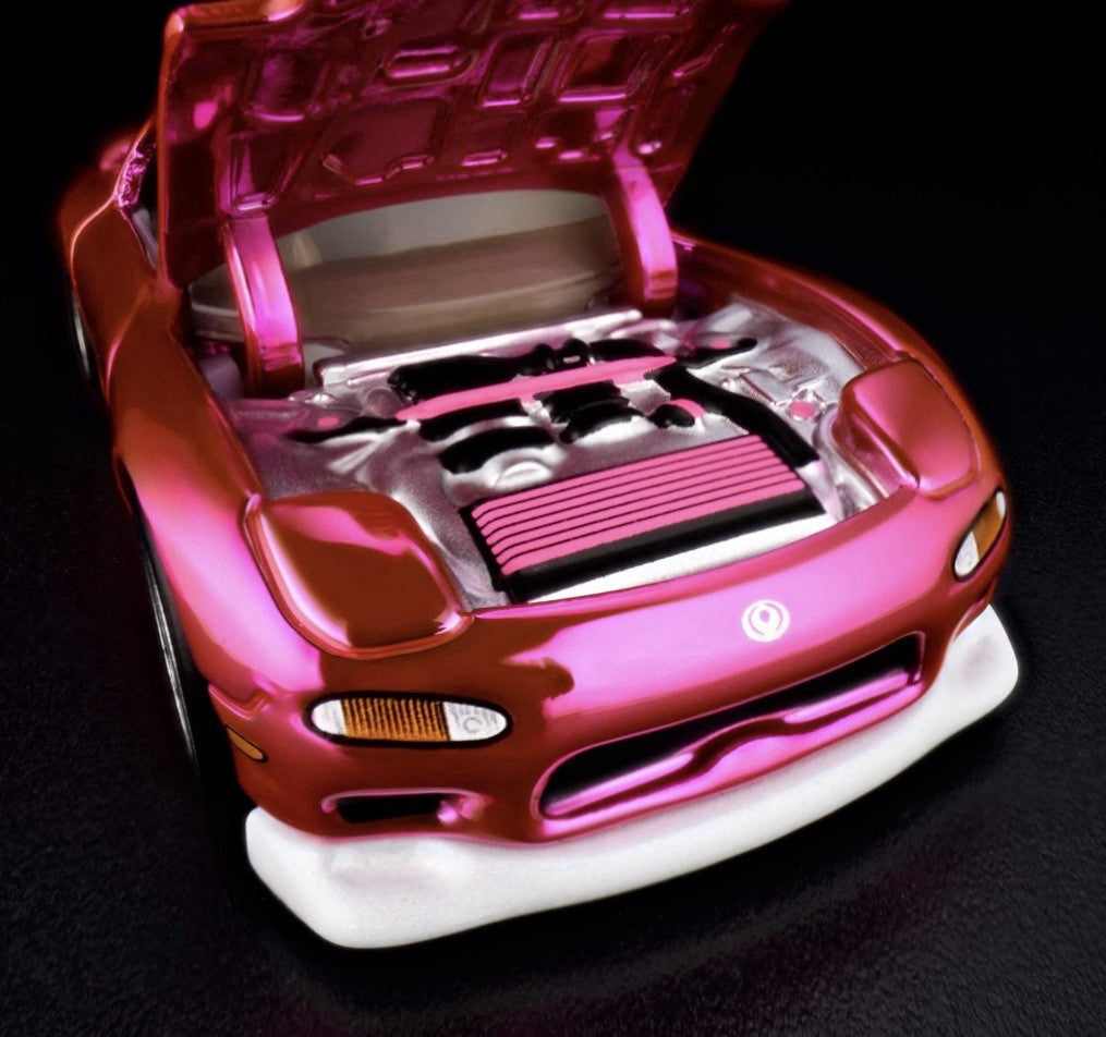 Hot Wheels die-cast sports car engine bay with hood open
