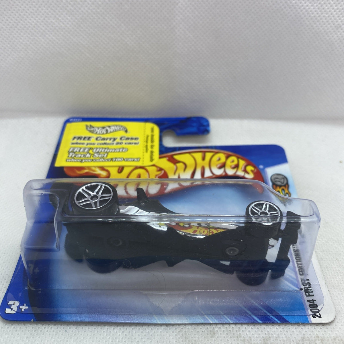 Hot Wheels F-Racer 2004 black car in blister, #030 shown on card edge