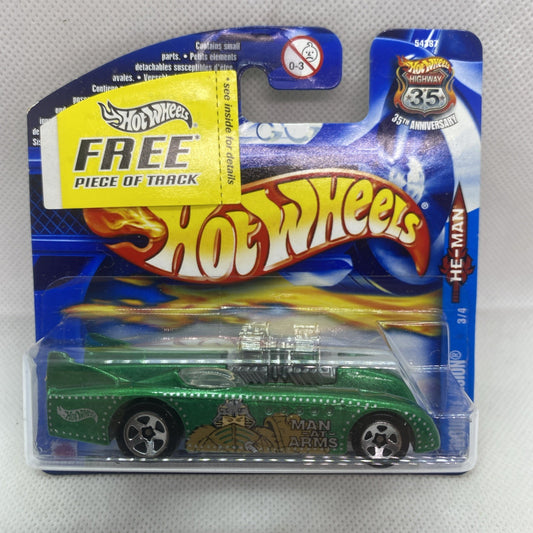 Carded green Hot Wheels vehicle in clear blister on blue packaging with yellow logo
