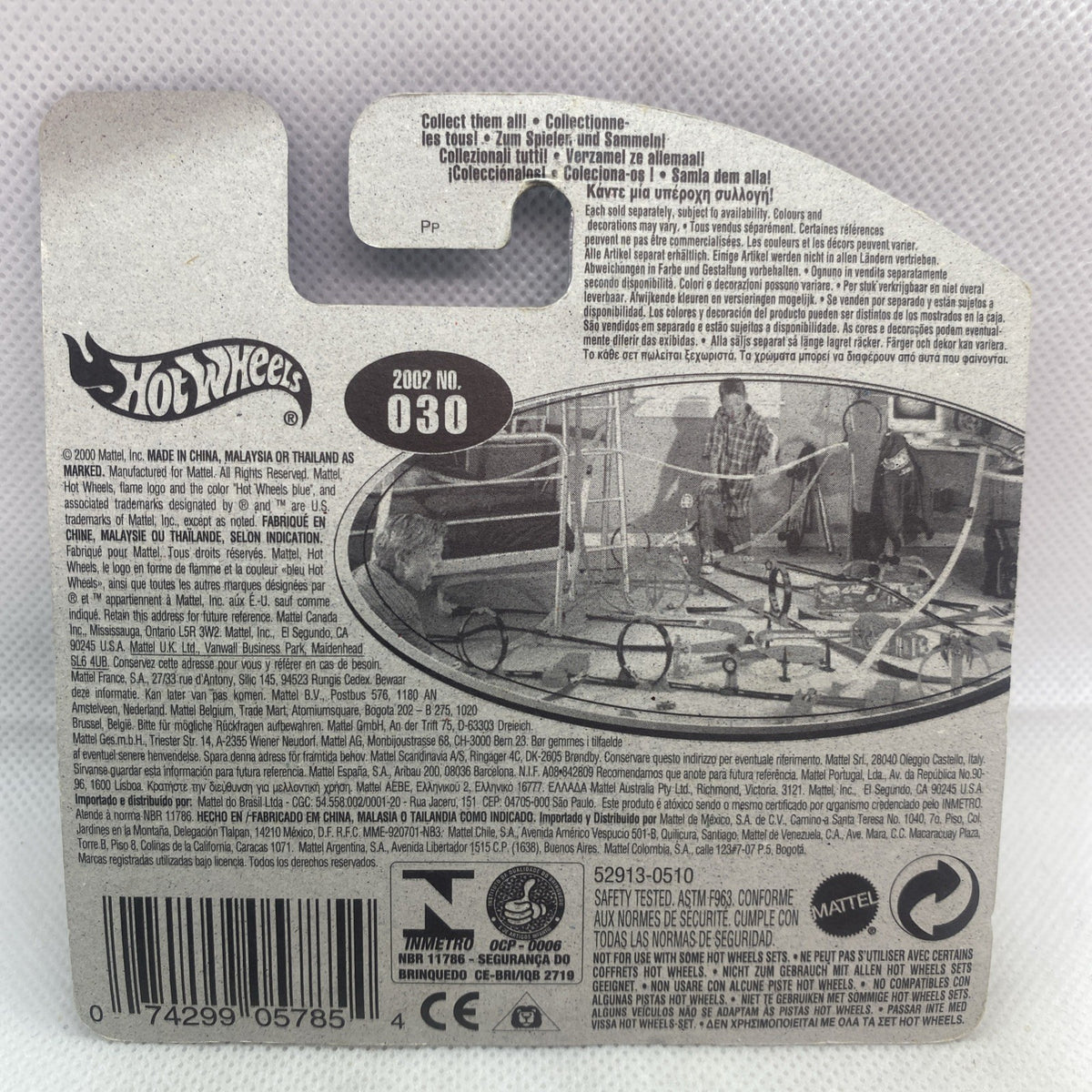 Hot Wheels car blister back side with black info panel and 2002 No. 030 label