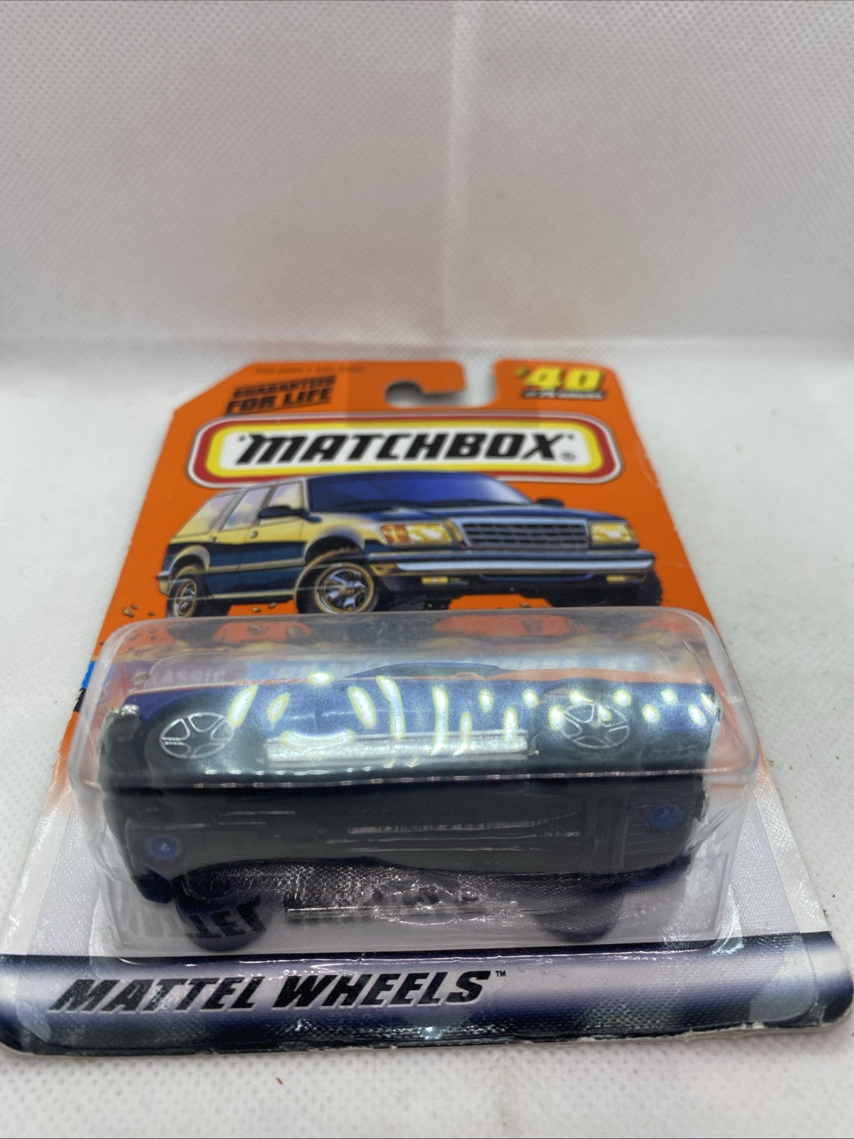Sealed Matchbox blister showing blue '68 Mustang Cobra Jet die-cast car, front view