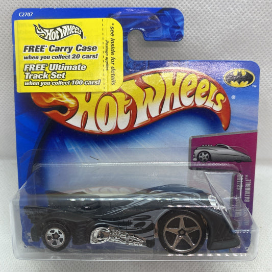 Hot Wheels Batmobile die-cast car in clear blister pack with yellow track-case card
