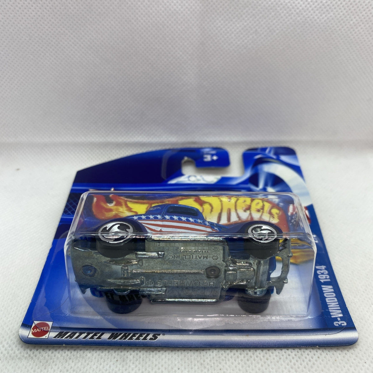 Hot Wheels Star-Spangled 3-Window car blister pack viewed from above, sealed