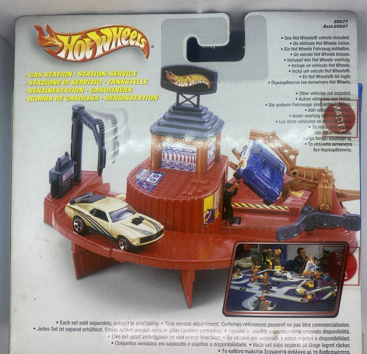 Hot Wheels gas station playset on orange base with car and station tower in box
