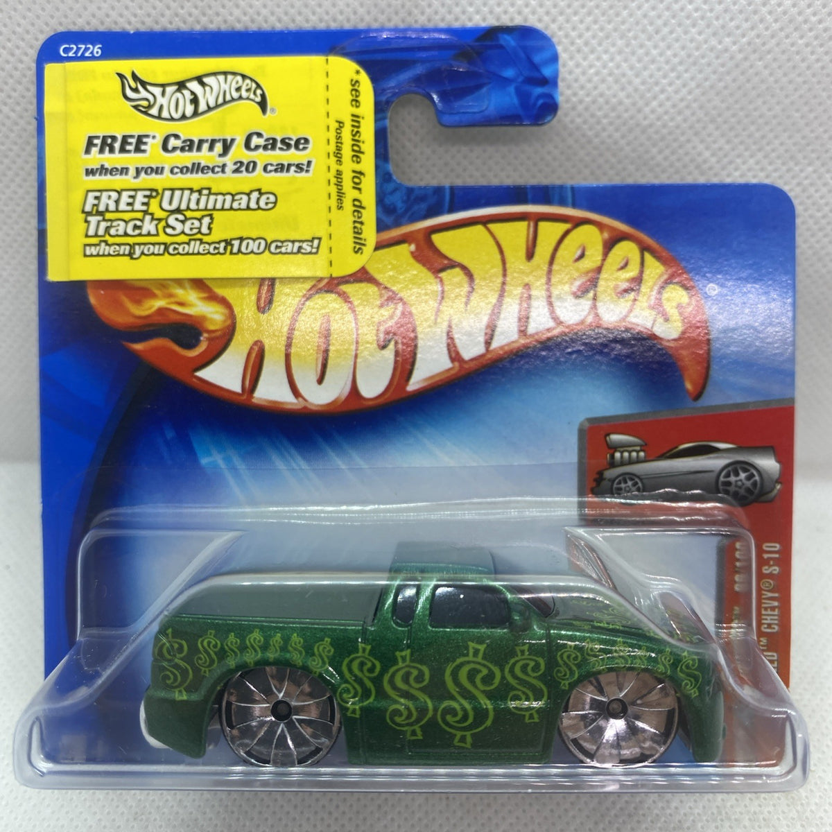 Hot Wheels green die-cast truck in clear blister on blue short card, front view