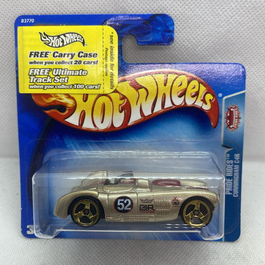 Hot Wheels blister pack showing gold die-cast race car on blue card backing