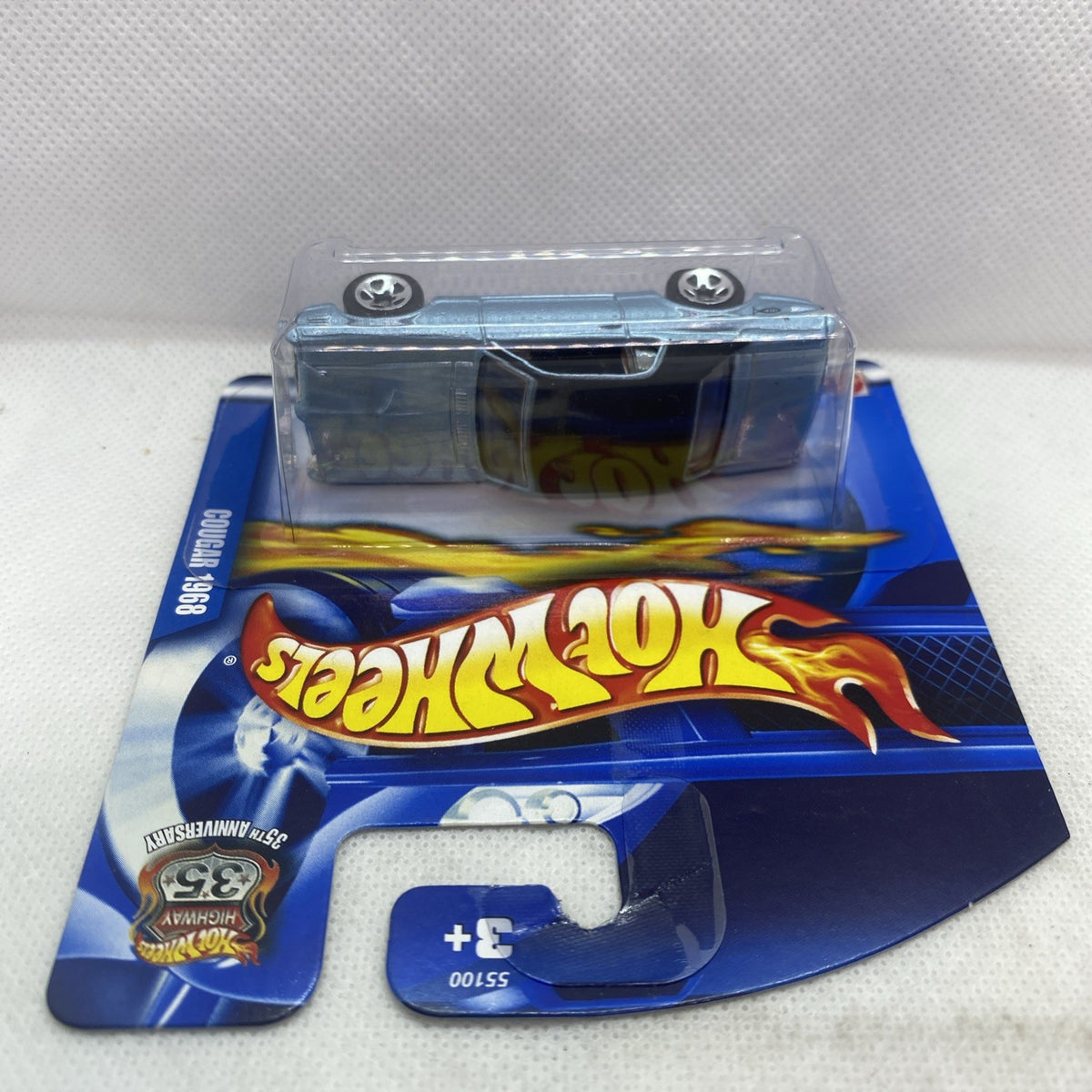 Hot Wheels die-cast ’68 Cougar on blue blister card, top view