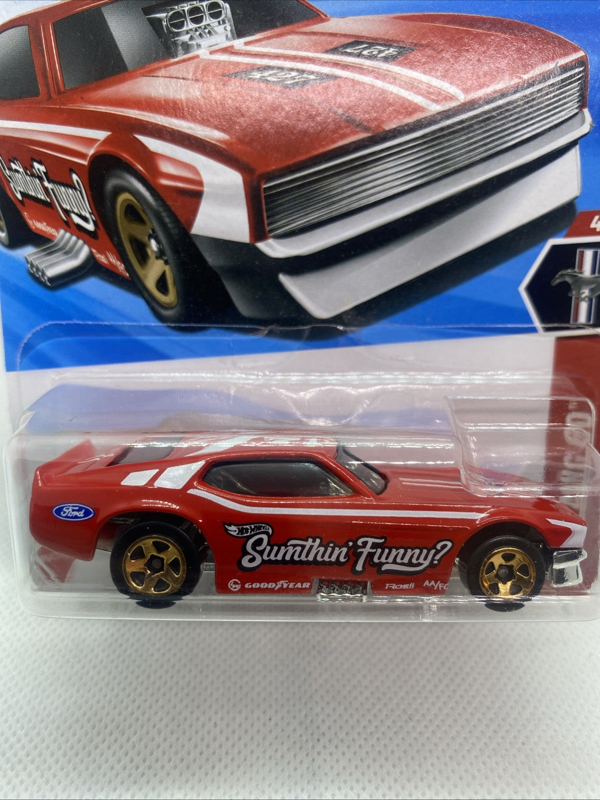 Hot Wheels '71 Mustang Funny Car toy in sealed blister, red coupe side profile close-up