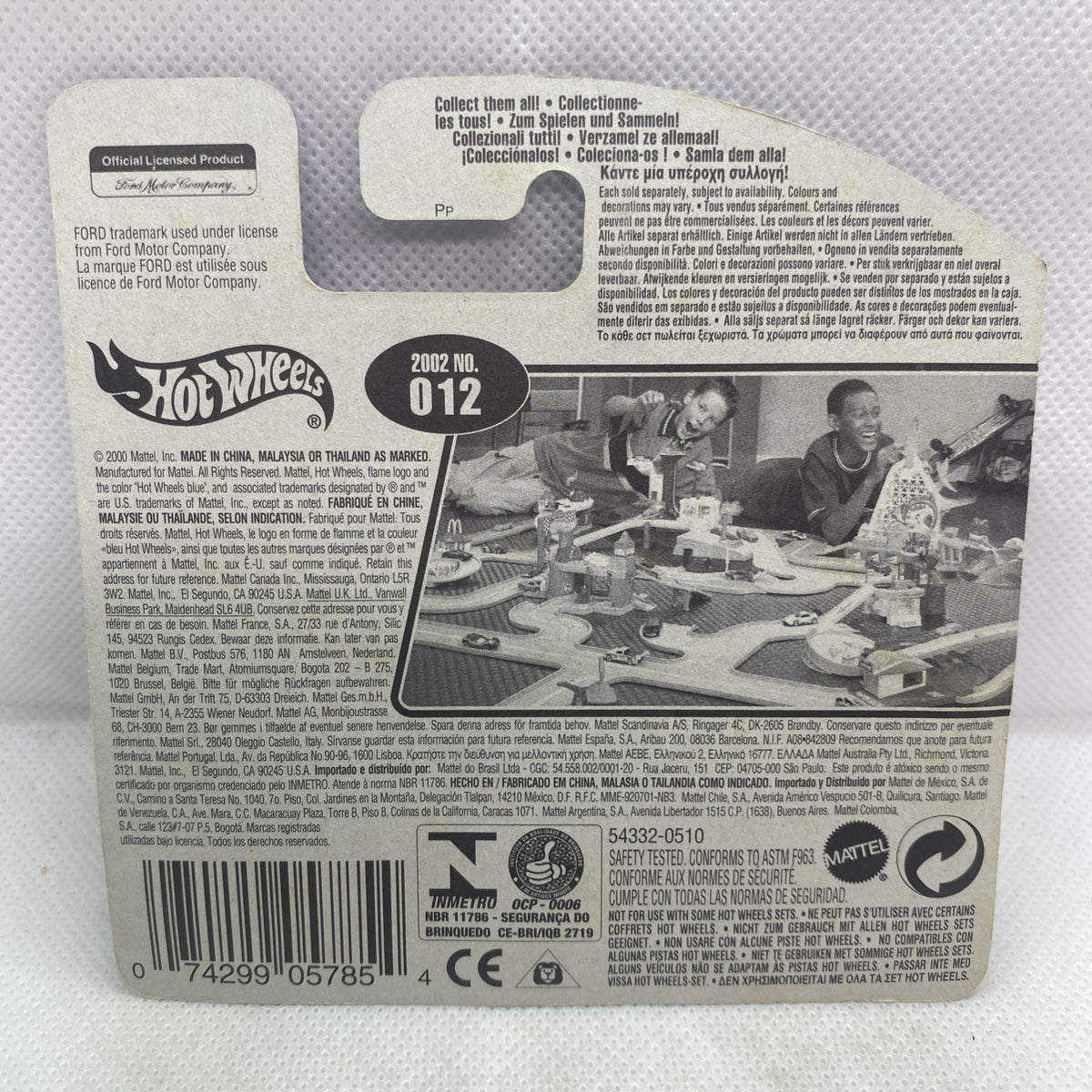 Hot Wheels toy car blister back with barcode and product info card, number 012