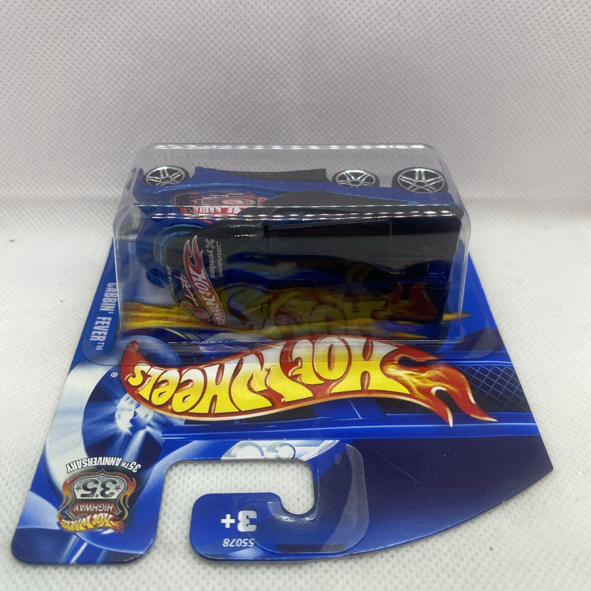 Blue Hot Wheels die-cast car in blister pack with flame decal stripe