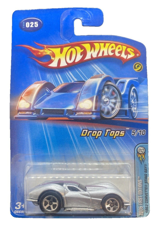Hot Wheels die-cast Corvette model in silver on blue card, Drop Tops 5/10