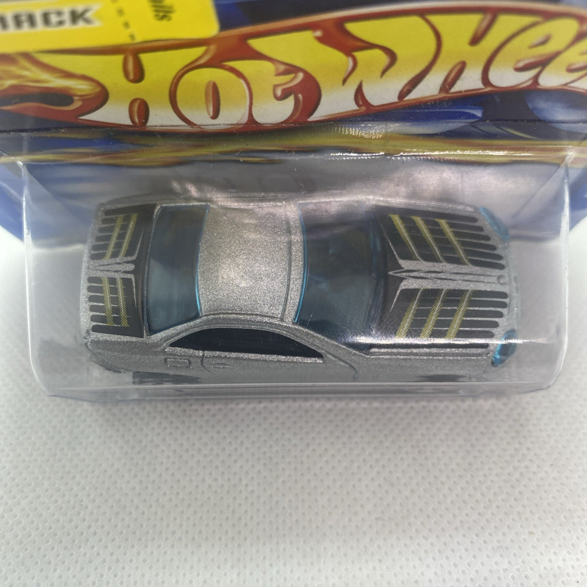 Hot Wheels Mercedes-Benz SLK 2001 toy car close-up, rear vents and wheels