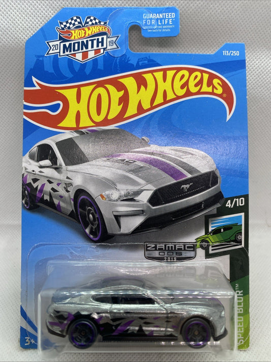Hot Wheels die-cast 2018 Ford Mustang GT in long blister card, silver with purple graphics