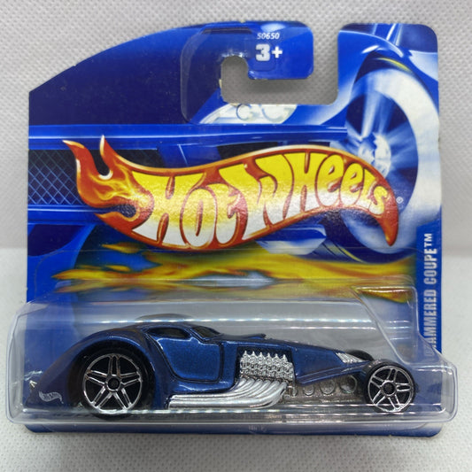 Hot Wheels Hammered Coupe 2001 die-cast car on blue blister card, front half visible