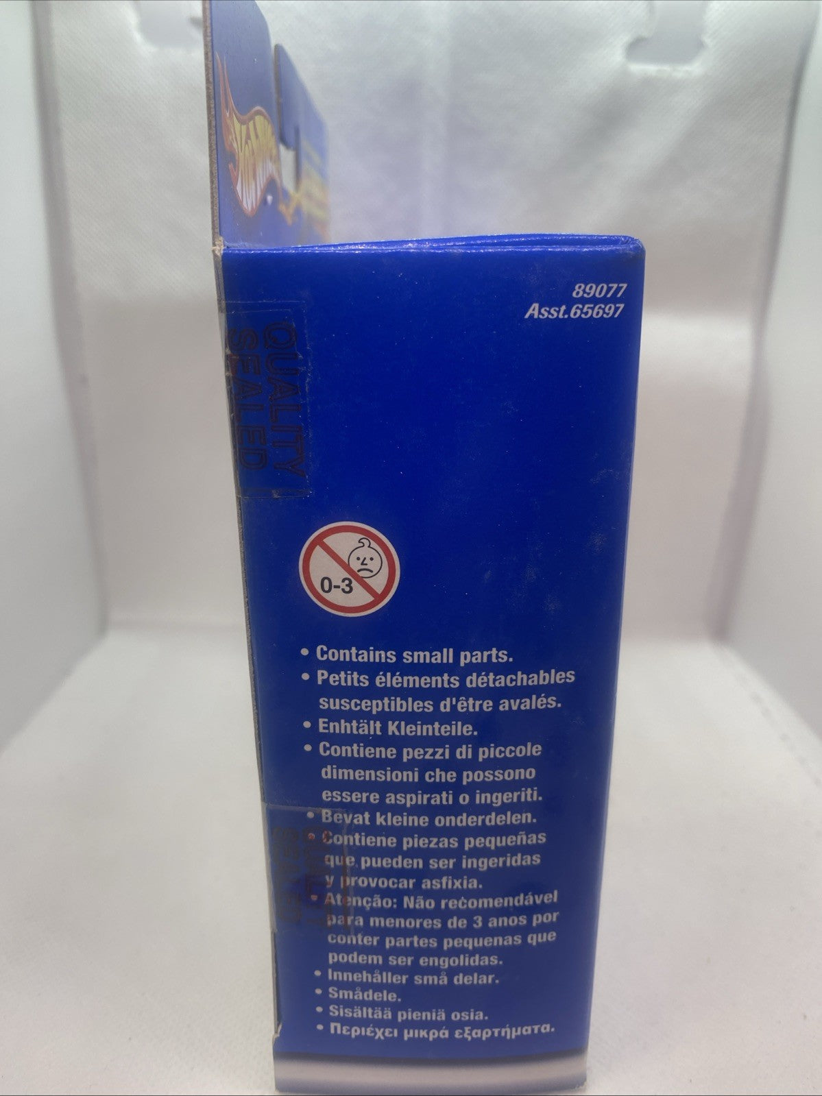 Hot Wheels playset box side panel with age warning and small-parts notice