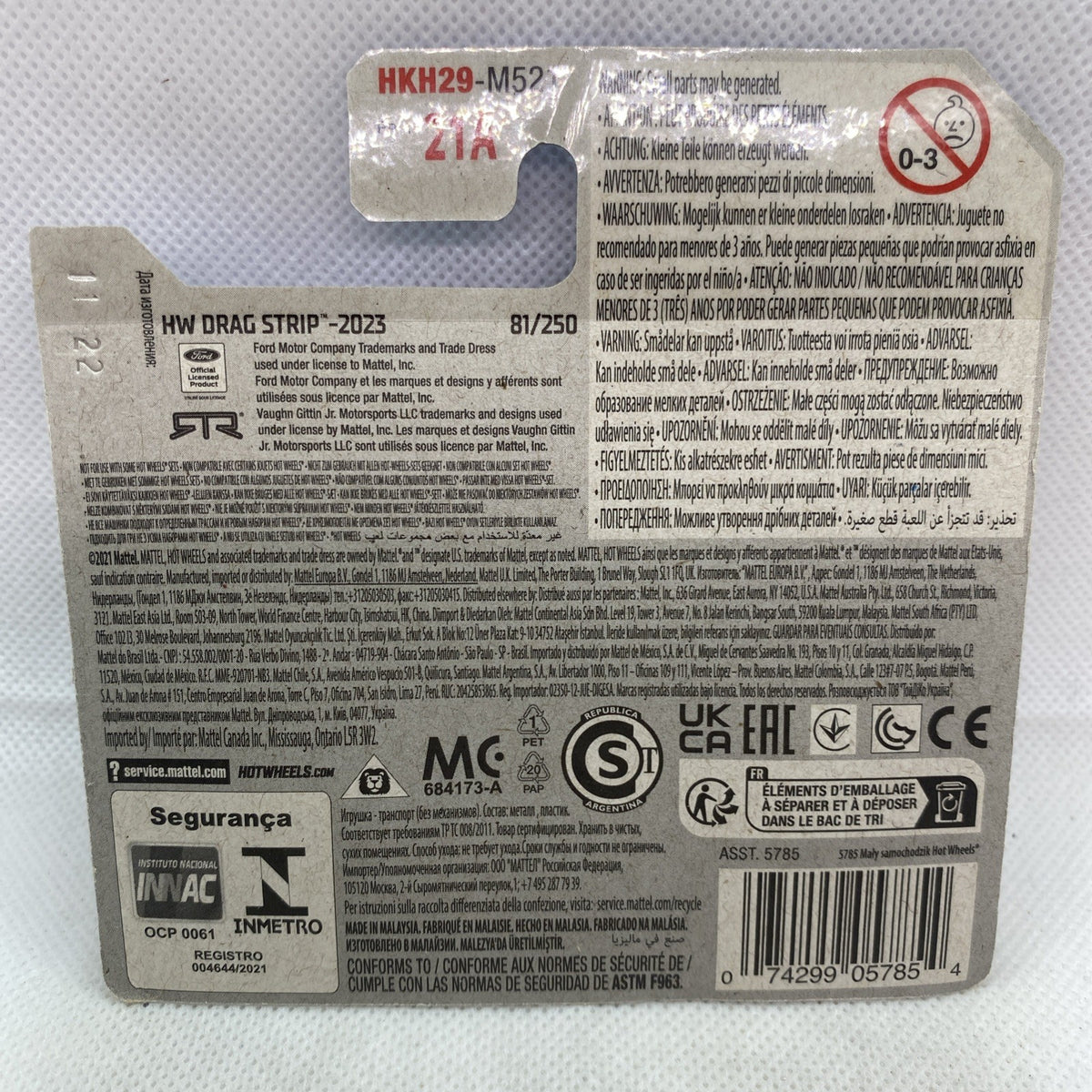 Hot Wheels toy car blister back card with specifications and barcode label