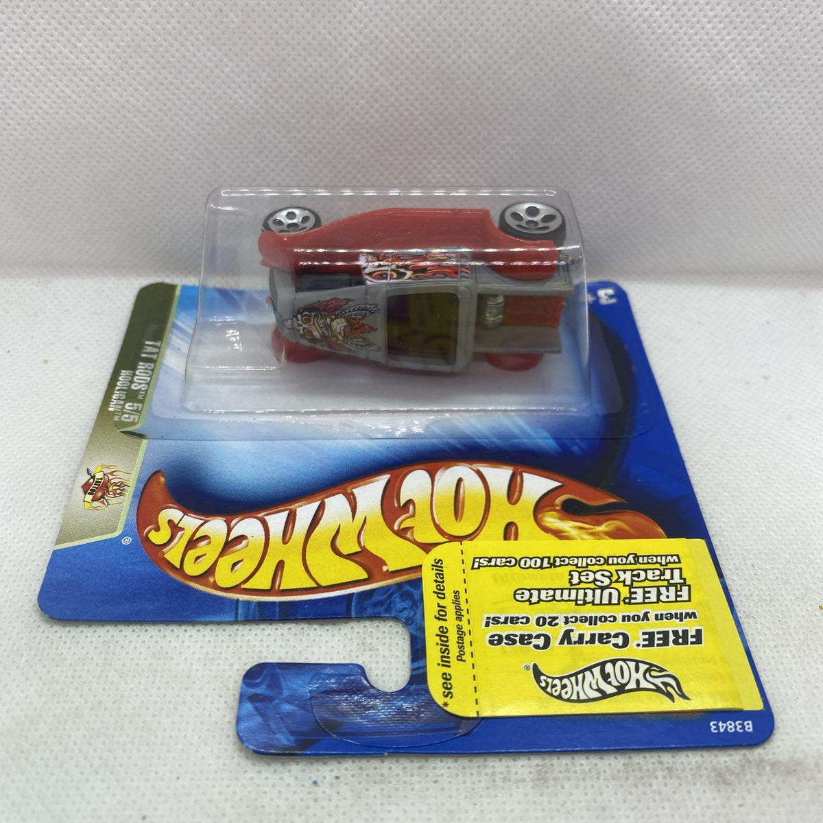 Hot Wheels Hooligan die-cast car blister package, red car with black engine details
