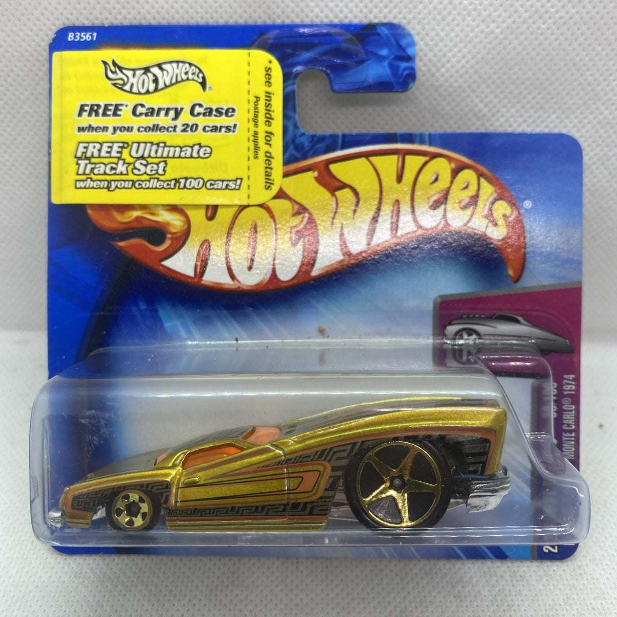 Hot Wheels die-cast car in clear blister on blue card, gold with black wheels