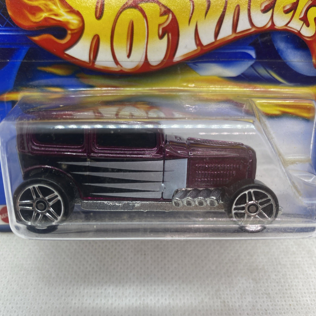 Hot Wheels Midnight Otto die-cast car in clear blister, dark maroon pickup