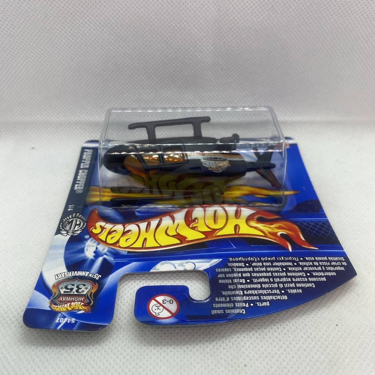 Hot Wheels Propper Chopper die-cast helicopter in clear blister, black with orange panel